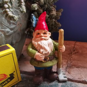 Gnome with Rake on stake